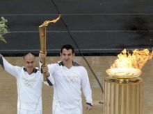 الشرطةالبريطانية تحذر من التعرض لمسيرة الشعلة الأولمبية!!! 