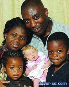 زوجان بريطانيان أسودان ينجبان طفلة بيضاء 
